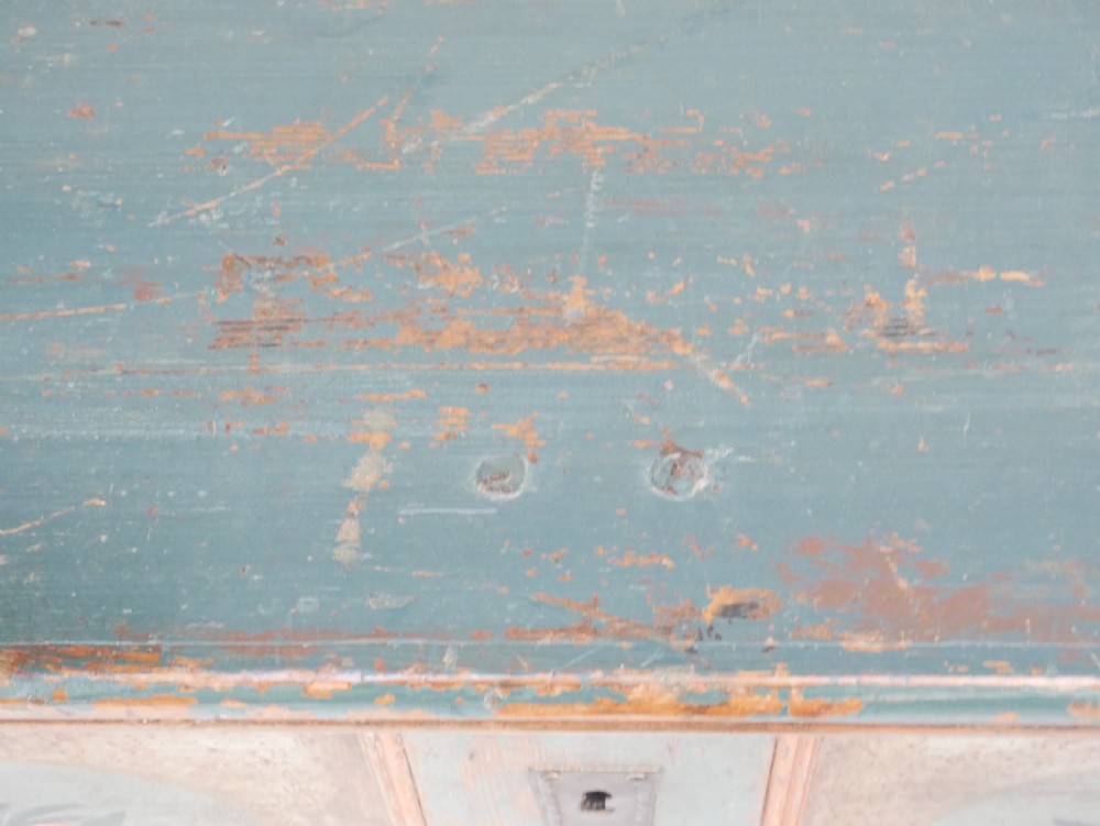 A 19th-century Swedish painted wooden coffer chest featuring green paint, oval floral medallions, moulded framing, and hand-painted initials dated 1810. View X