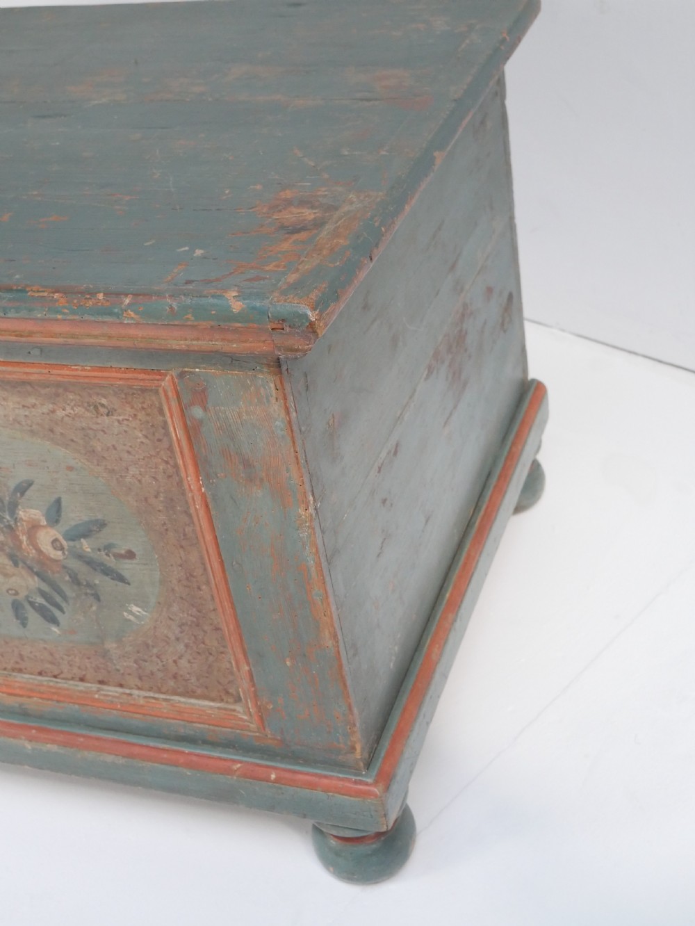 A 19th-century Swedish painted wooden coffer chest featuring green paint, oval floral medallions, moulded framing, and hand-painted initials dated 1810. View XI