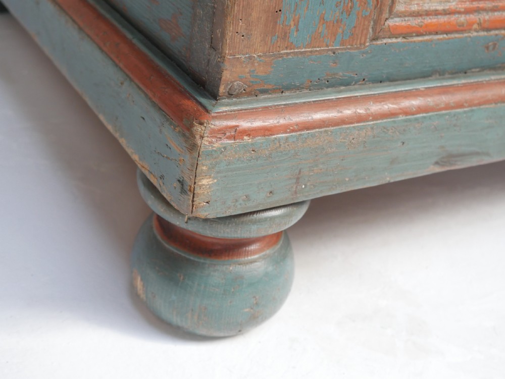 A 19th-century Swedish painted wooden coffer chest featuring green paint, oval floral medallions, moulded framing, and hand-painted initials dated 1810. View XIV
