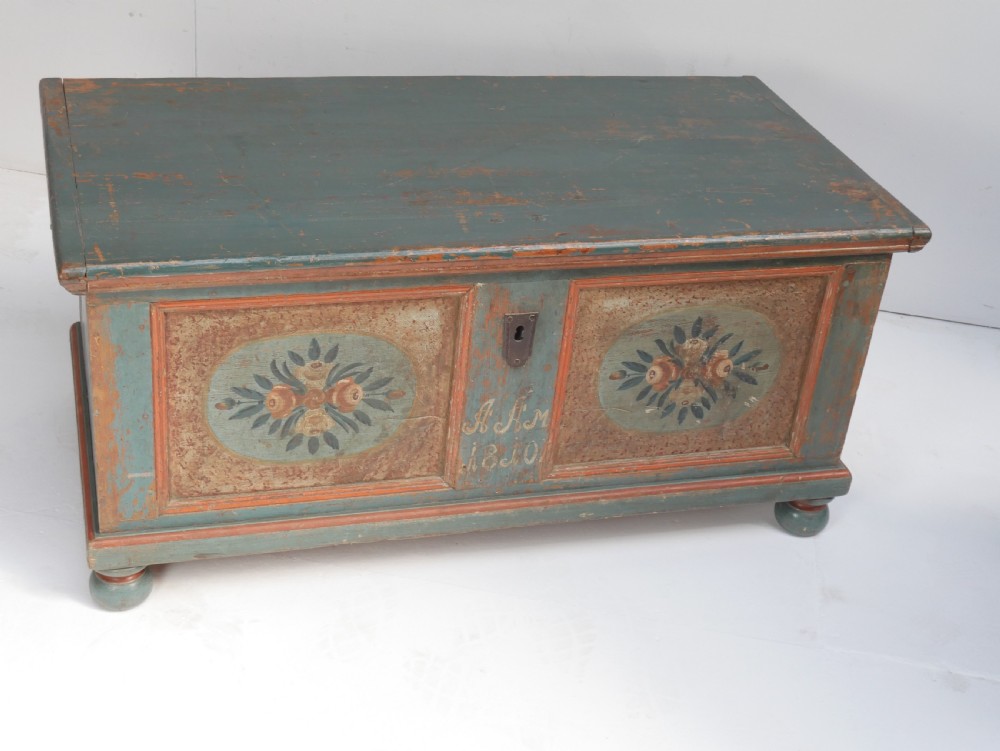 A 19th-century Swedish painted wooden coffer chest featuring green paint, oval floral medallions, moulded framing, and hand-painted initials dated 1810. View XVI