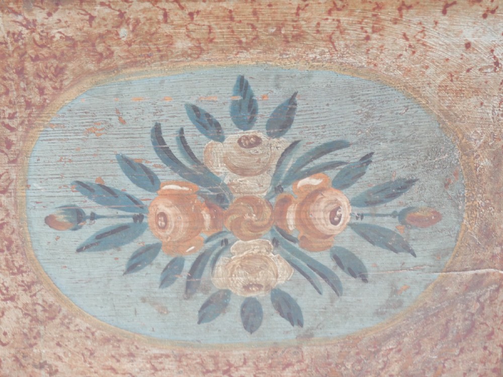 A 19th-century Swedish painted wooden coffer chest featuring green paint, oval floral medallions, moulded framing, and hand-painted initials dated 1810. View XVIII