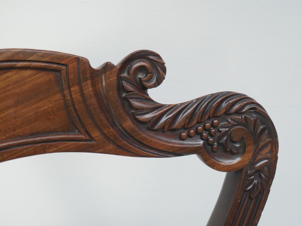 Pair of Regency mahogany side chairs with blue fabric seats and turned reeded legs. View VIII