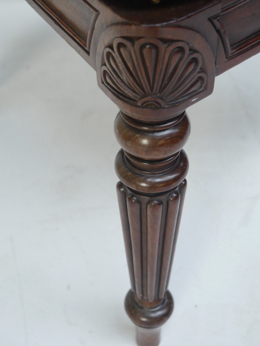 Pair of Regency mahogany side chairs with blue fabric seats and turned reeded legs. View XIII
