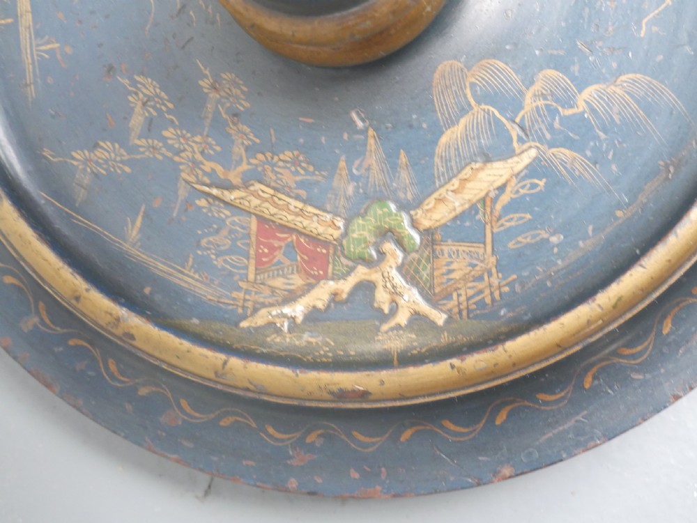 A tall turned wooden standard lamp painted dark blue with hand-painted gilt Chinoiserie botanical motifs and a circular base. View IV