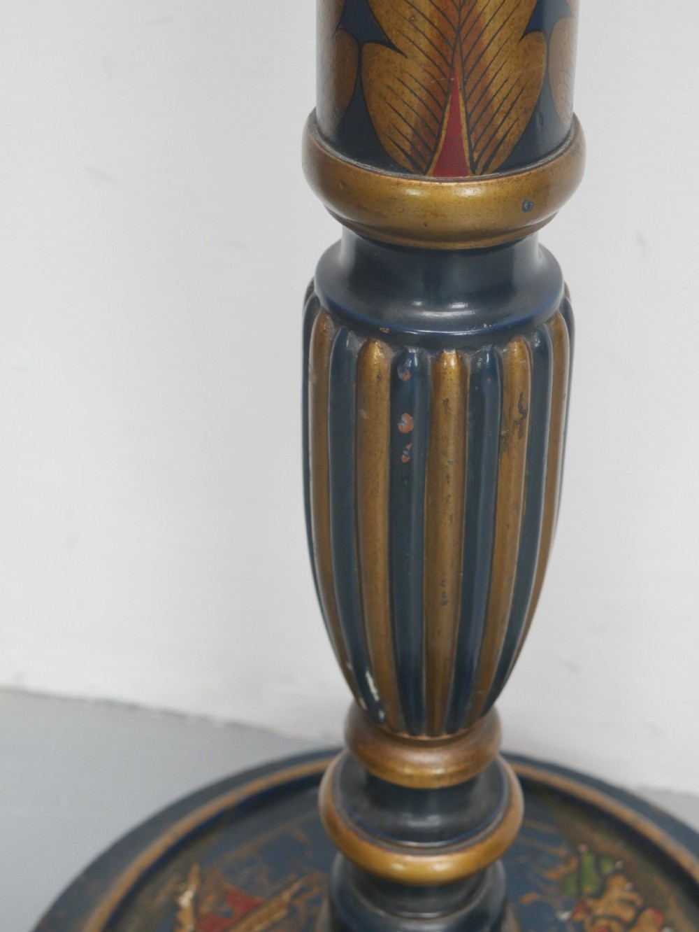 A tall turned wooden standard lamp painted dark blue with hand-painted gilt Chinoiserie botanical motifs and a circular base. View VI