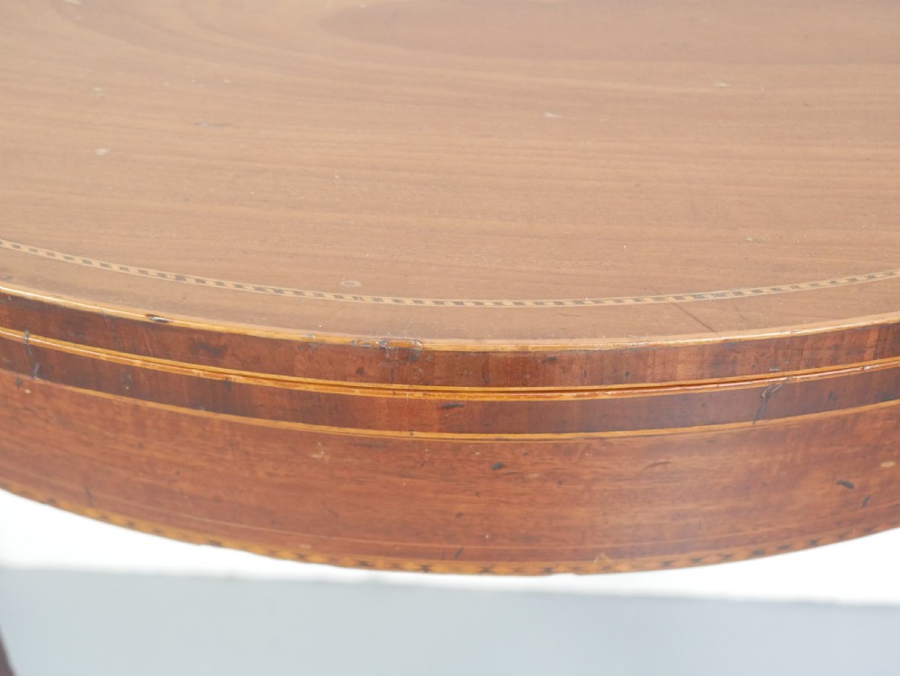 A Scottish Georgian mahogany demi-lune fold-over side table with inlaid square tapered legs. View III