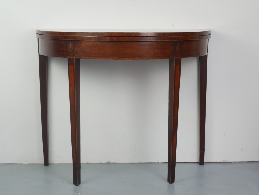 A Scottish Georgian mahogany demi-lune fold-over side table with inlaid square tapered legs. View XIV