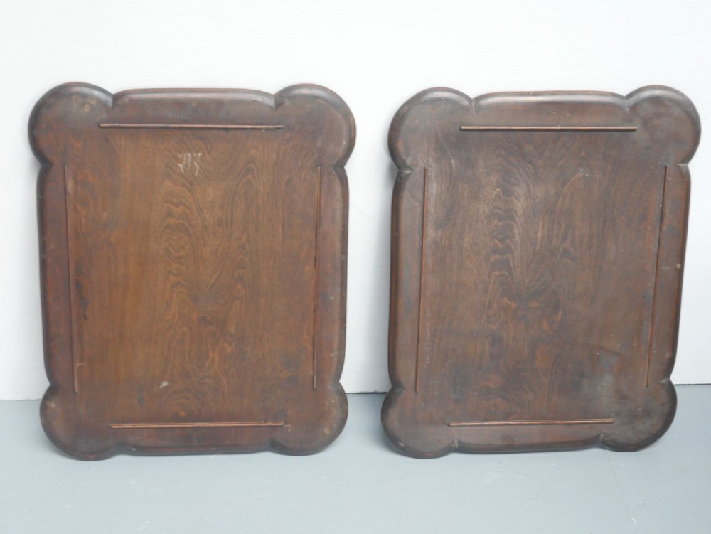 A matching pair of polished warm brown mahogany side tables featuring raised tray-top edges, turned legs, and curved X-stretchers. View XIX