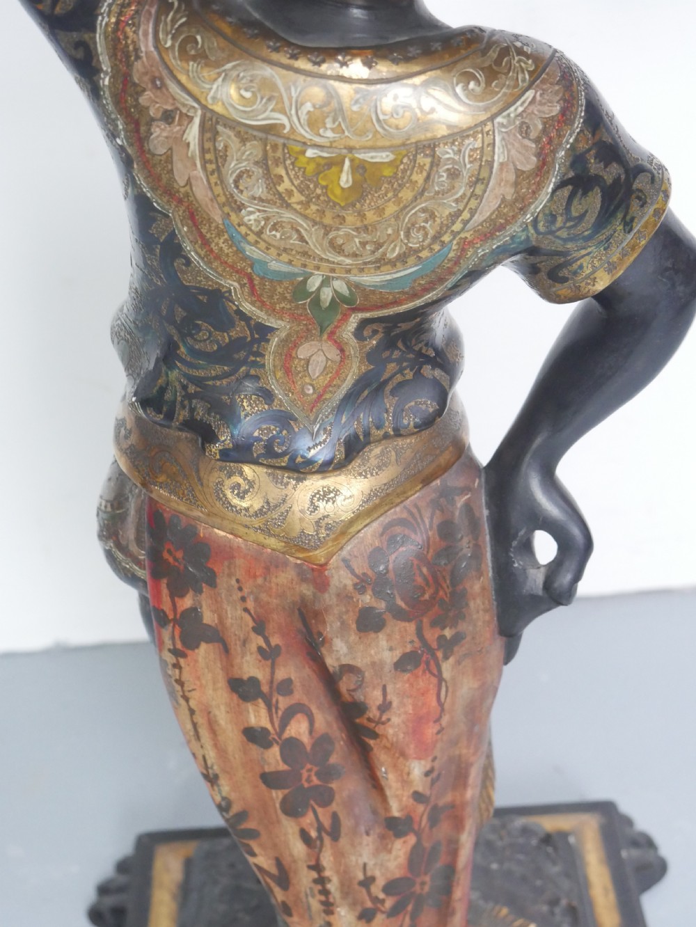 A 19th-century carved polychrome and gilded wooden Venetian side table depicting a figural stand supporting a draped canopy top with hanging tassels. View IX