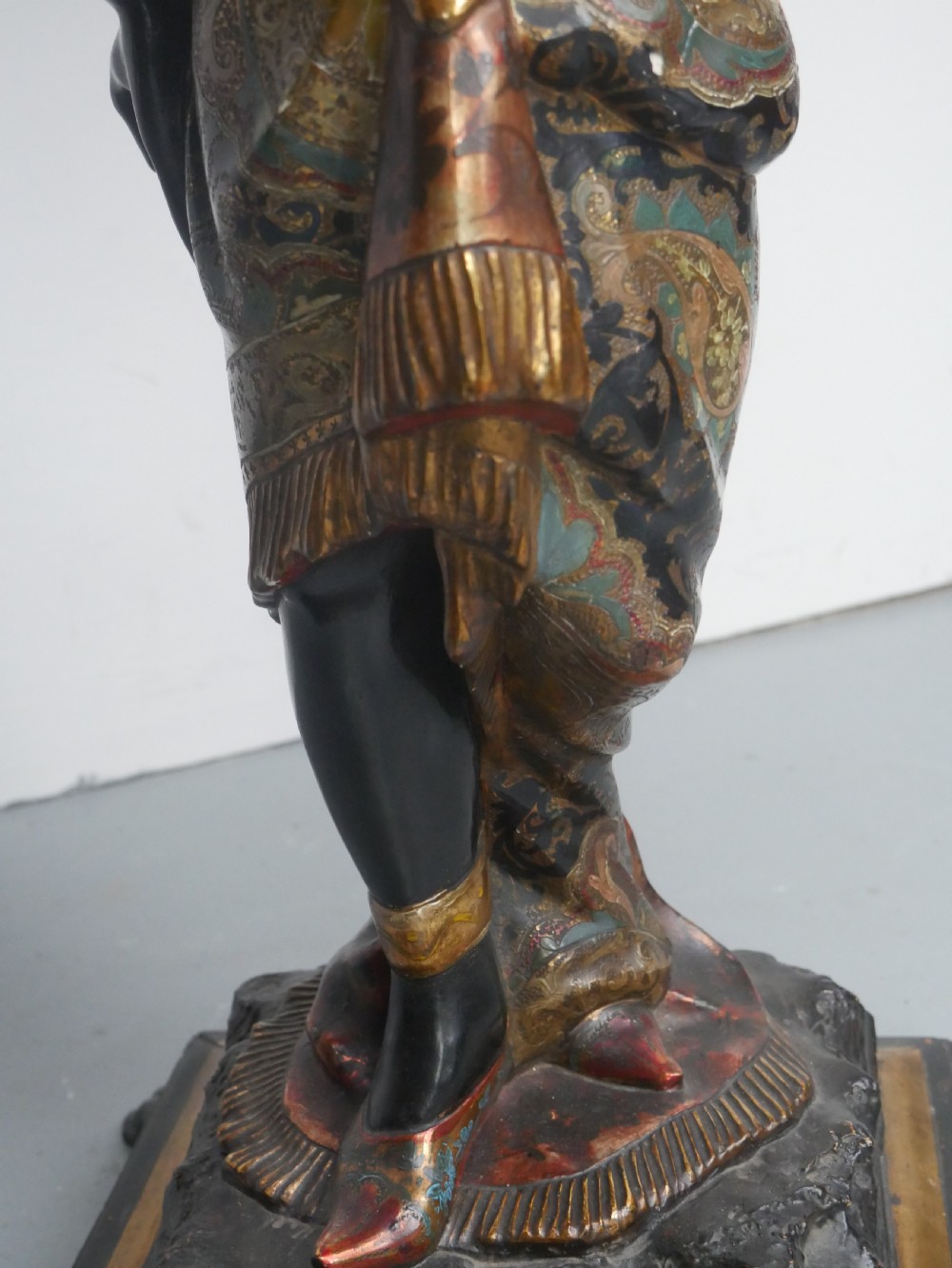 A 19th-century carved polychrome and gilded wooden Venetian side table depicting a figural stand supporting a draped canopy top with hanging tassels. View XIV