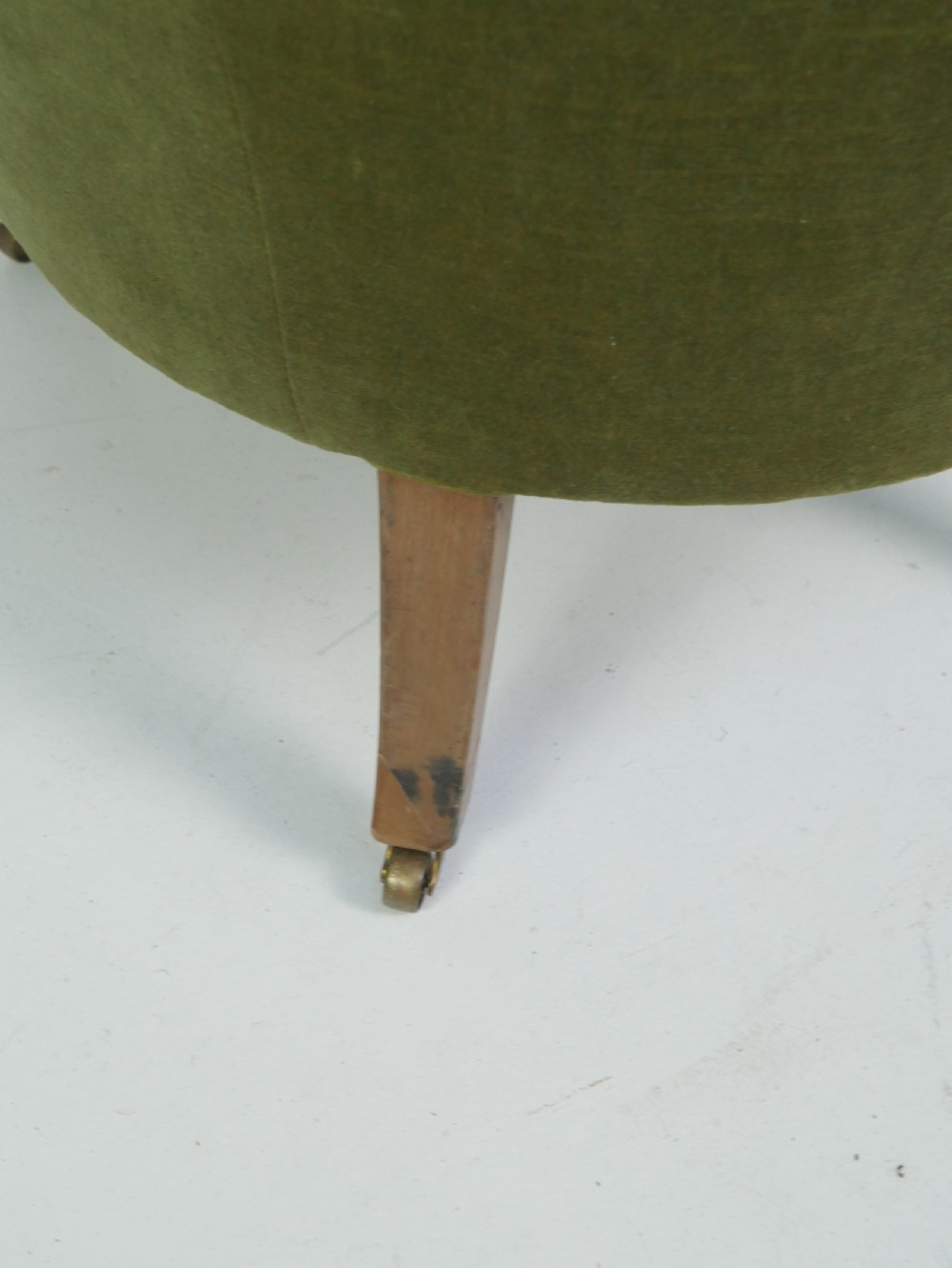 A Regency period style armchair upholstered in olive green velvet with floral needlepoint embroidery on the backrest and seat cushion. View VI