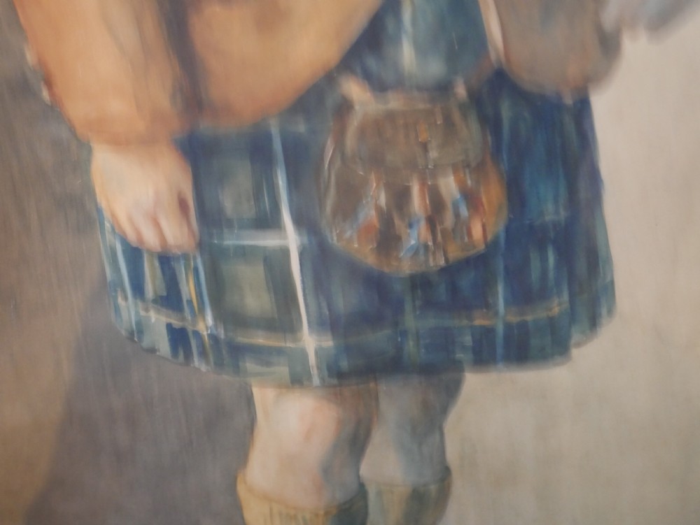 A framed watercolour portrait depicting a young boy standing in full Scottish Highland dress with a brown jacket and tartan kilt. View VIII