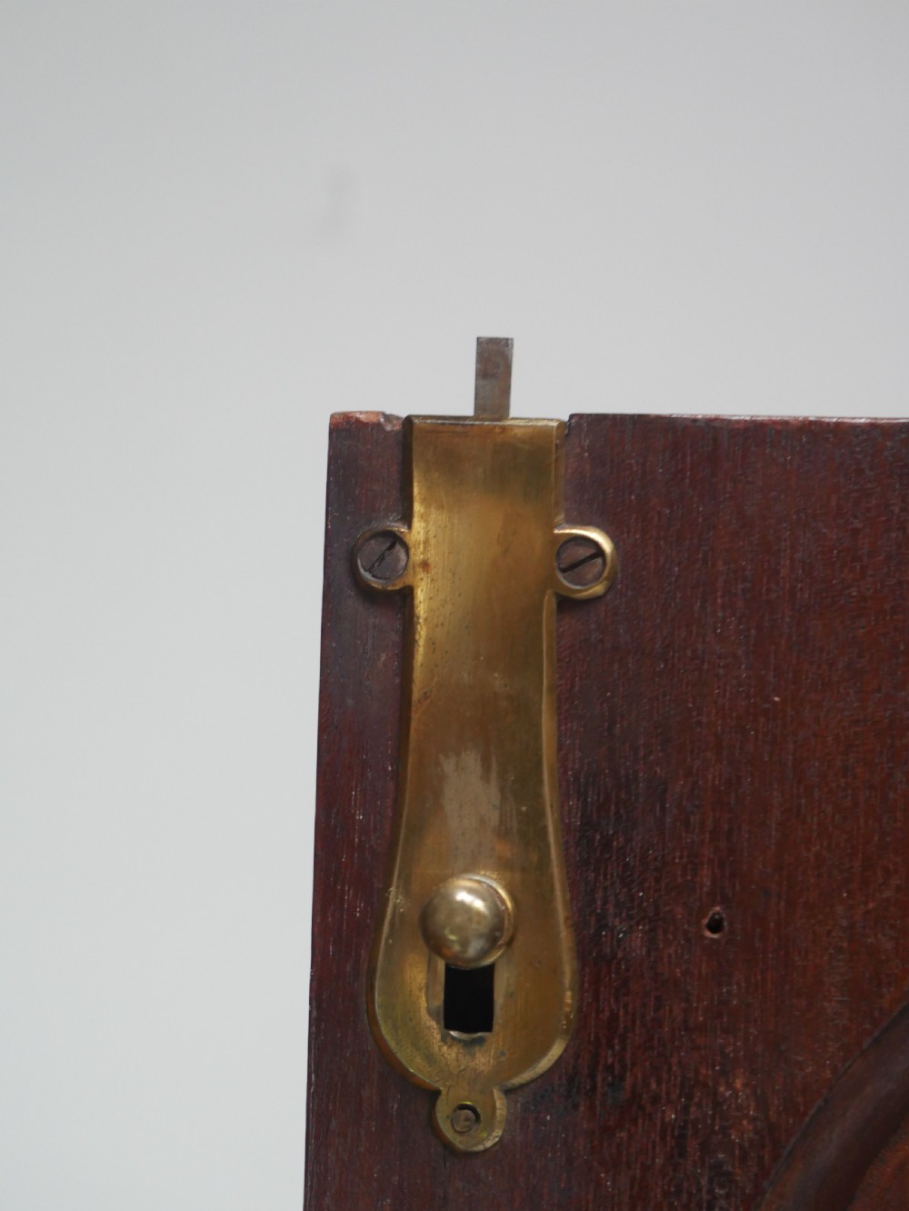 A Georgian mahogany double-door hanging wardrobe featuring shaped curvilinear door panels and sturdy bracket feet. View IV