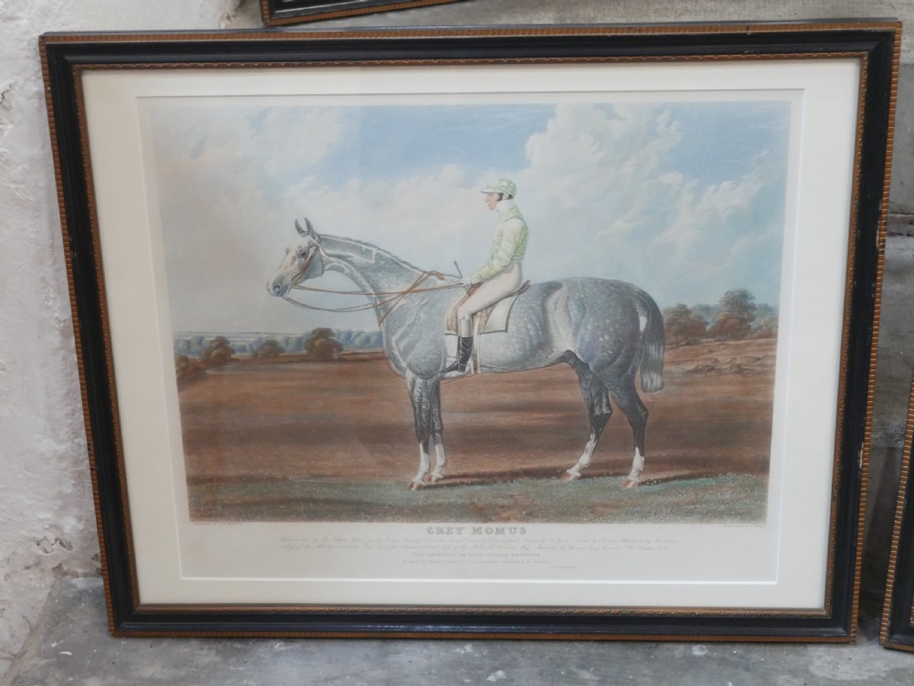 Set of five framed antique colour engravings depicting racehorses with jockeys in landscape settings. View IV