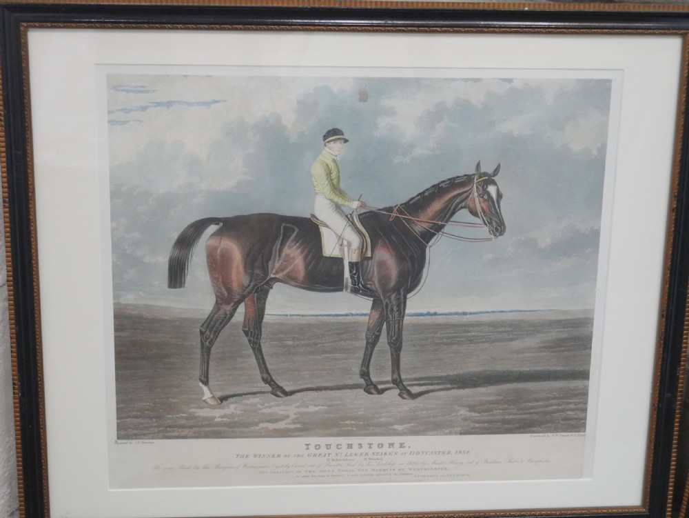 Set of five framed antique colour engravings depicting racehorses with jockeys in landscape settings. View VI