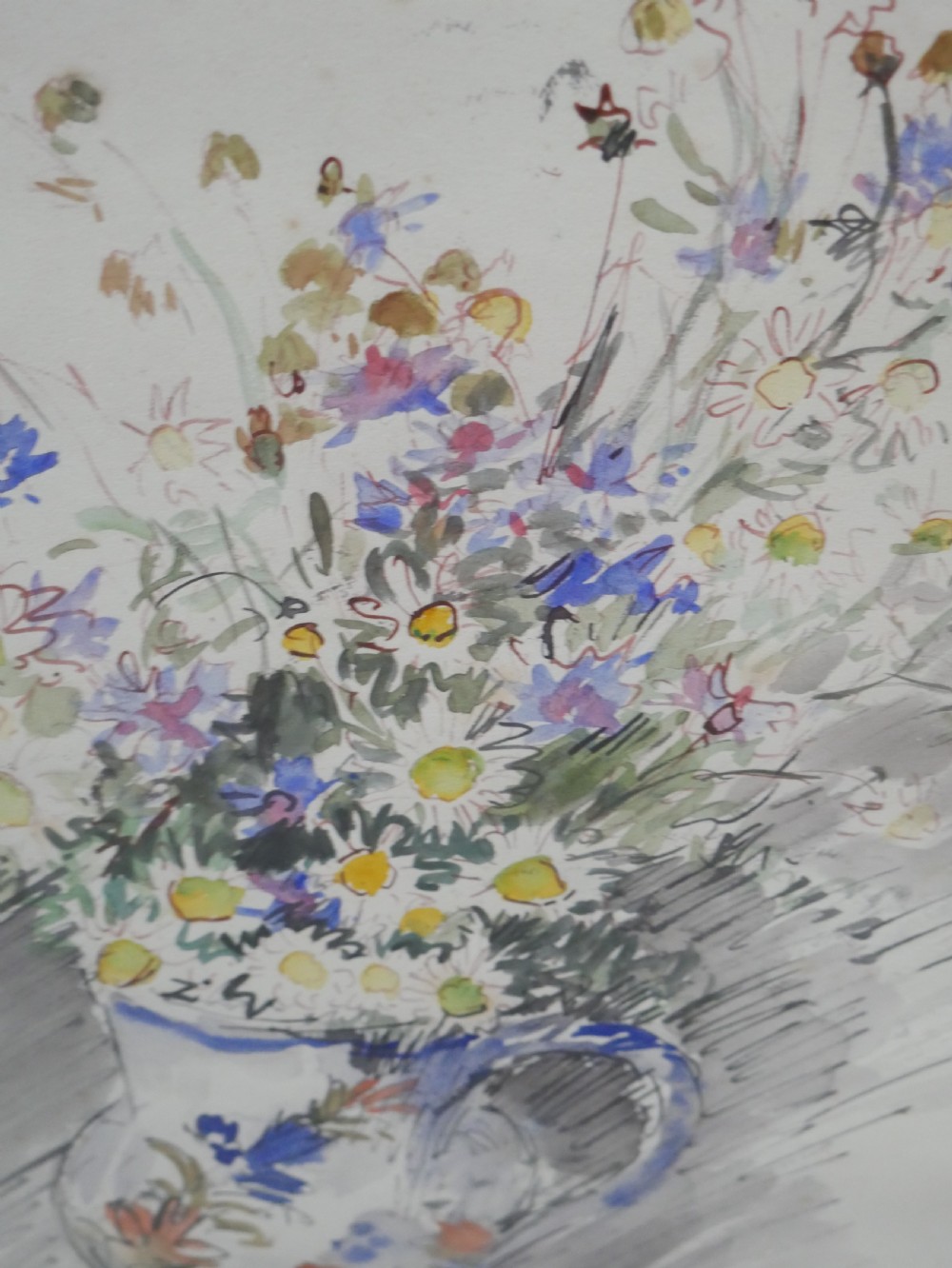 A framed floral watercolour still life painting depicting a bouquet of summer wildflowers in a ceramic jug within a carved giltwood frame. View VII