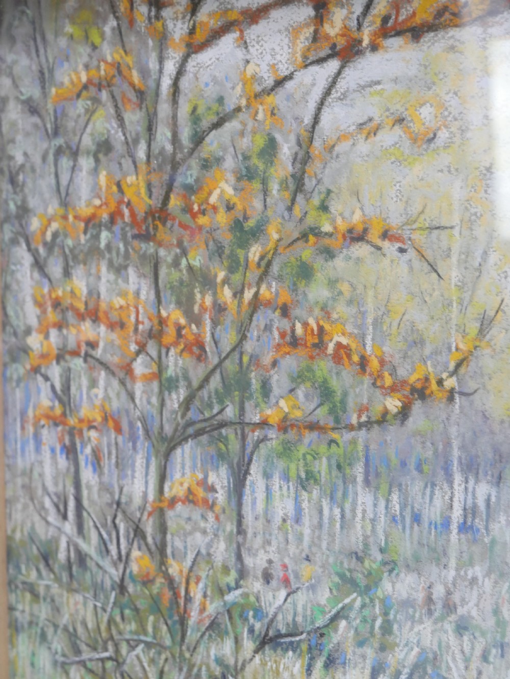 An antique pastel painting depicting an autumn woodland landscape, presented within a carved off-white frame. View V