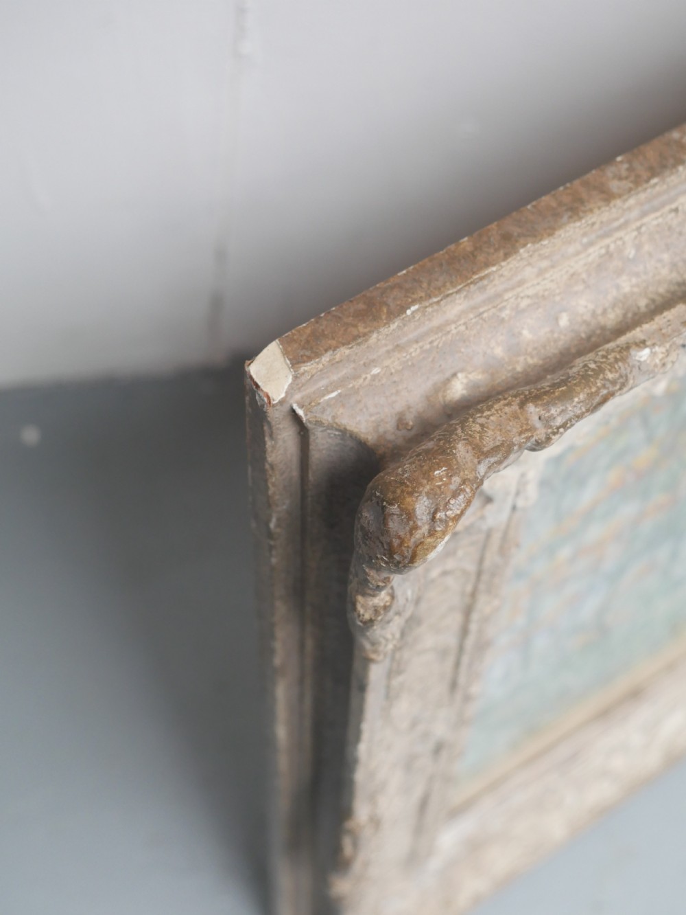 An antique pastel painting depicting an autumn woodland landscape, presented within a carved off-white frame. View VI