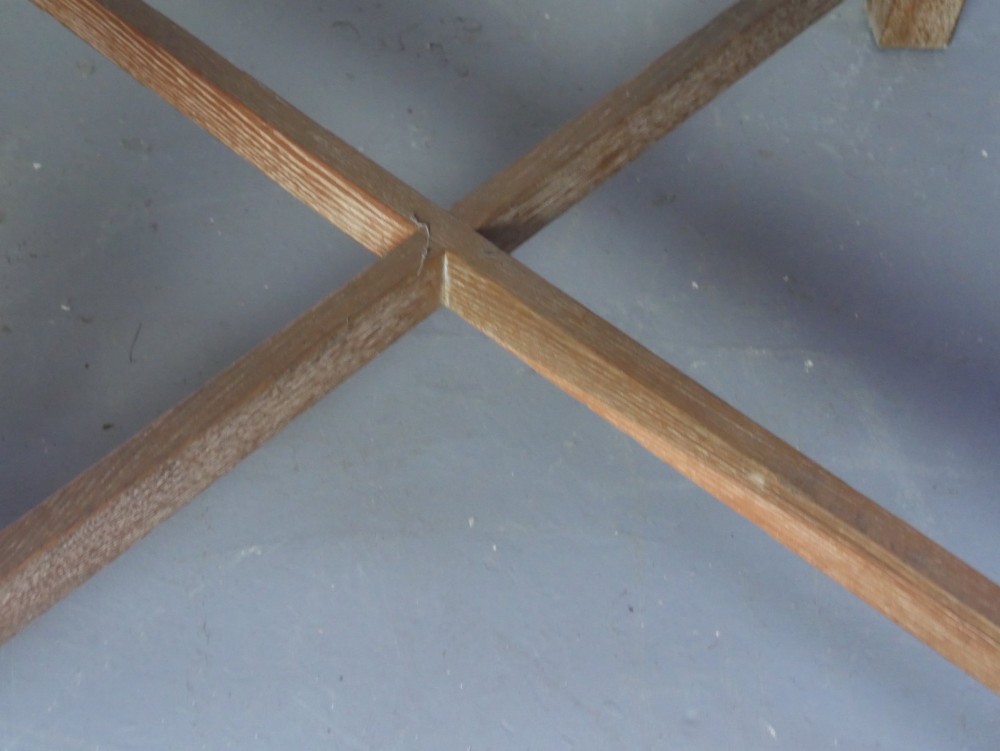 A square limed oak dining table featuring reeded legs, an X-shaped cross stretcher, and a draw-leaf top mechanism. View IX
