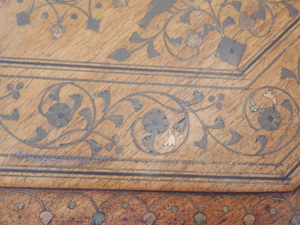 An octagonal Anglo-Indian dark wood side table decorated with intricate bone inlay patterns and pierced jali lattice arches. View VII
