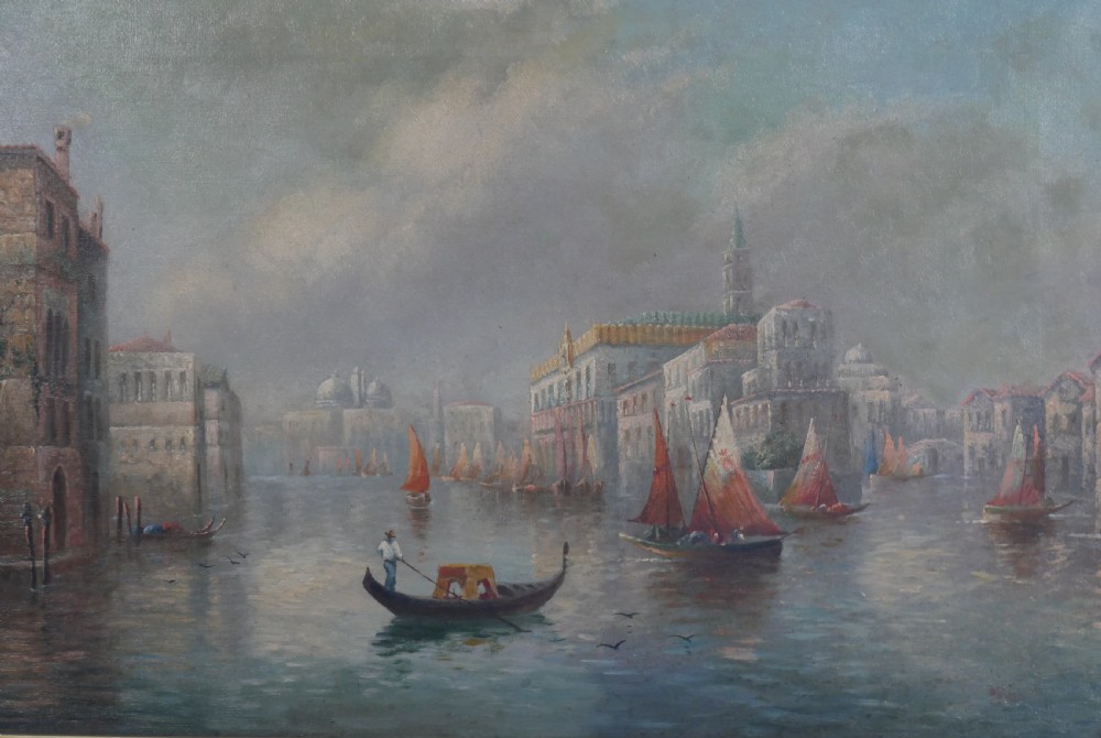 An antique oil painting depicting the Grand Canal in Venice with gondolas and historic buildings, encased in a textured gold gilded frame. View IV