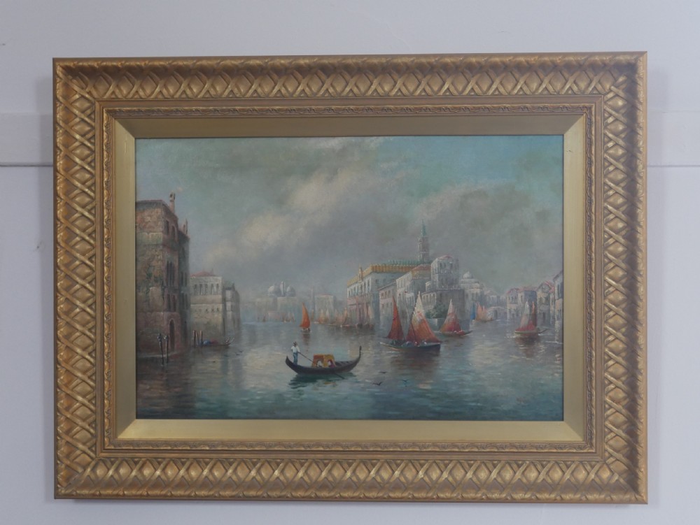 An antique oil painting depicting the Grand Canal in Venice with gondolas and historic buildings, encased in a textured gold gilded frame. View IX