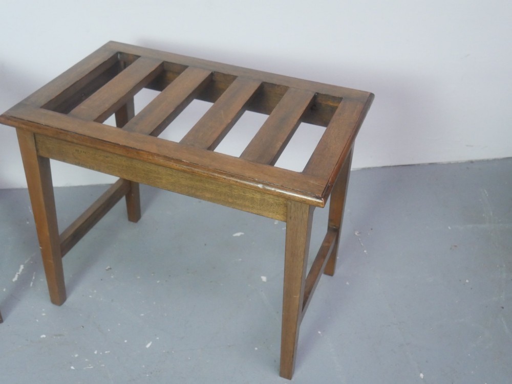 A pair of rectangular warm brown walnut luggage racks featuring slatted tops, straight stretchers, and tapered legs. View II