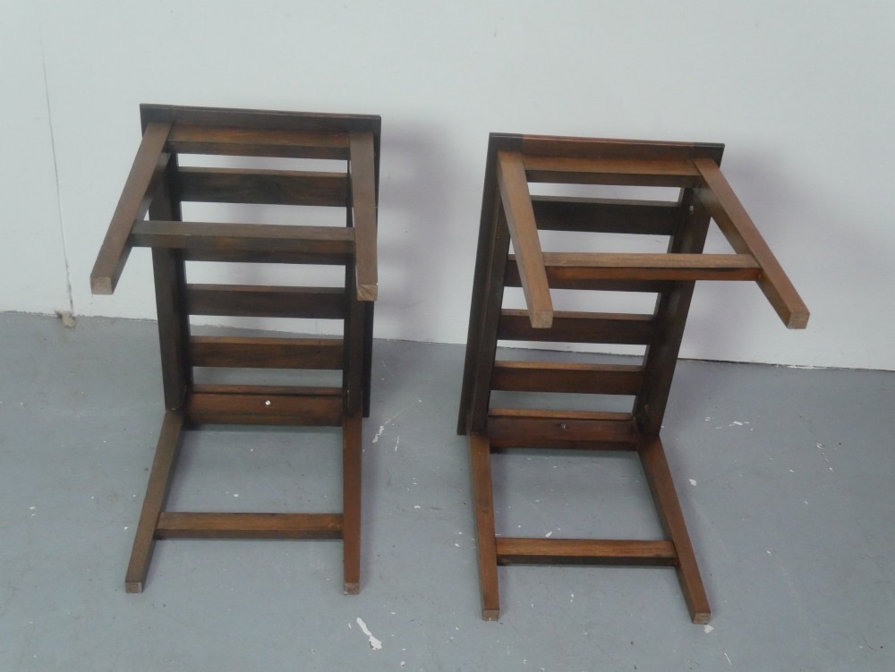 A pair of rectangular warm brown walnut luggage racks featuring slatted tops, straight stretchers, and tapered legs. View VII