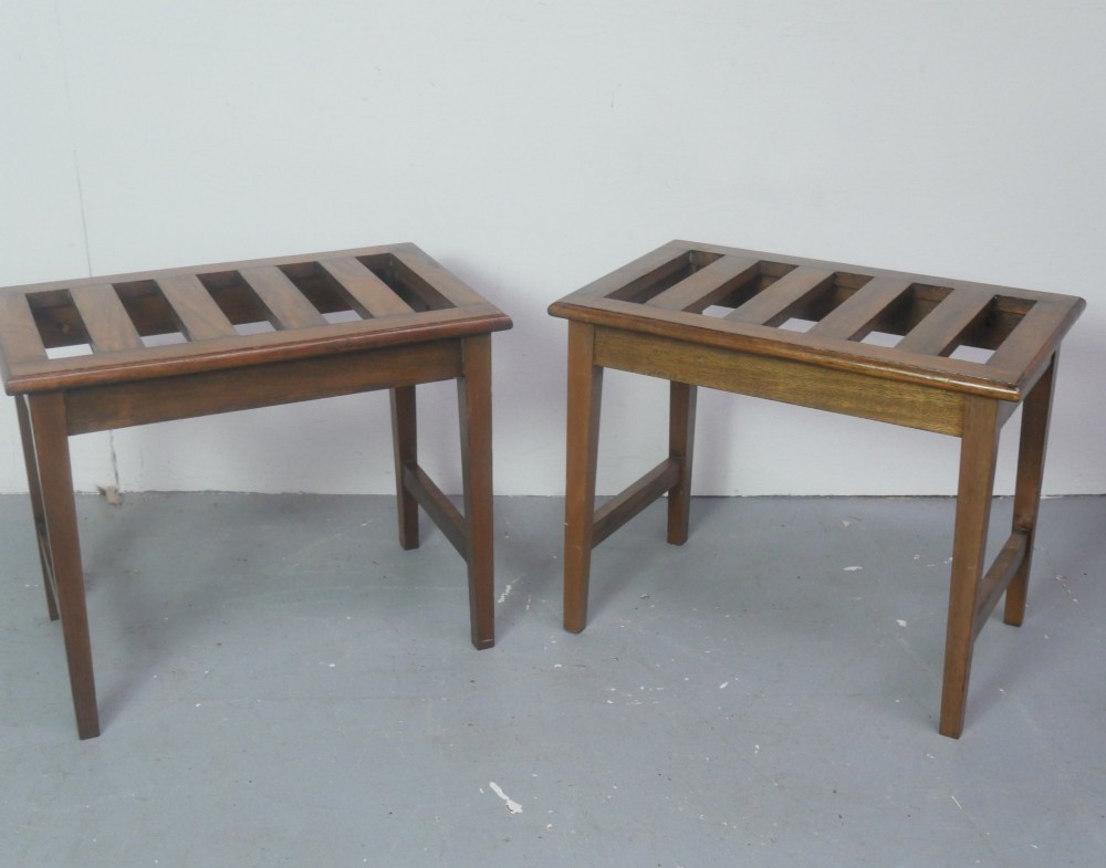 A pair of rectangular warm brown walnut luggage racks featuring slatted tops, straight stretchers, and tapered legs. View VIII
