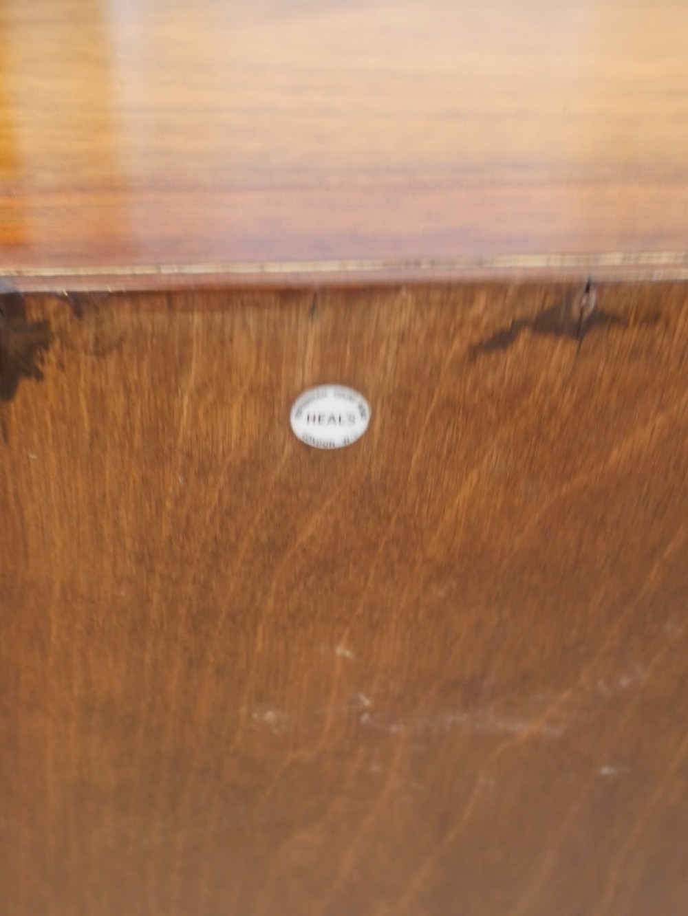A group of three rectilinear open wooden display boxes with warm timber grain. View VIII