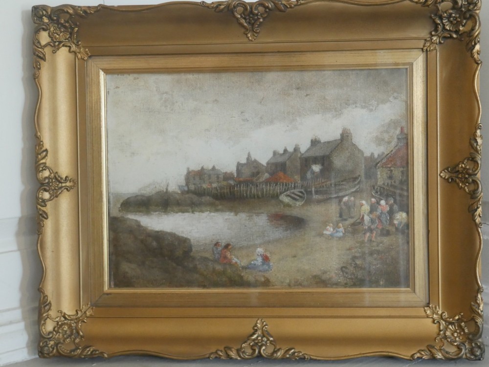 An antique oil painting depicting a coastal village harbour scene with figures along the shore, displayed within an ornate gold swept frame. View VIII