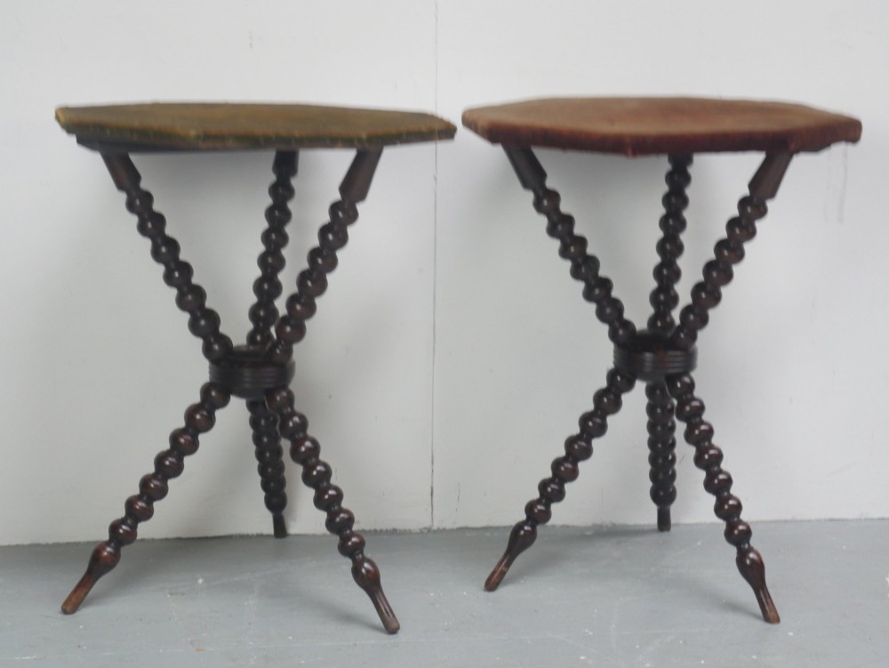 A pair of Victorian gypsy side tables featuring dark bobbin-turned tripod legs and octagonal fabric-covered tops in green and red. View XI