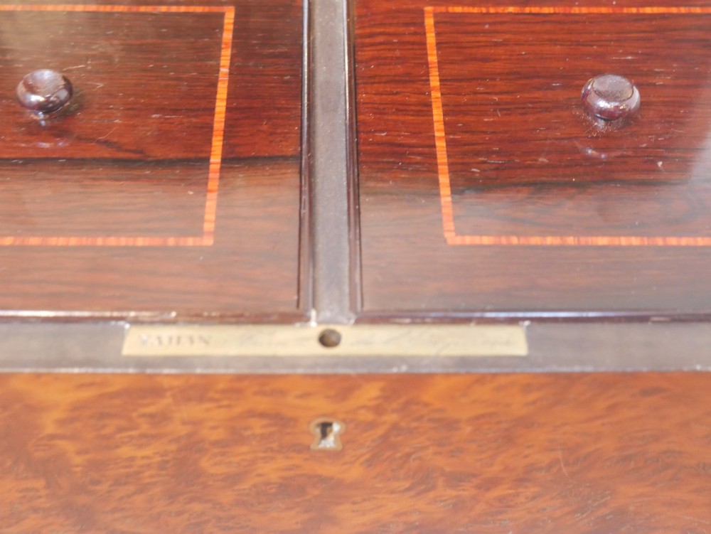 A 19th-century French amboyna wood box featuring canted corners, brass edging, and central brass inlay on the lid. View VII