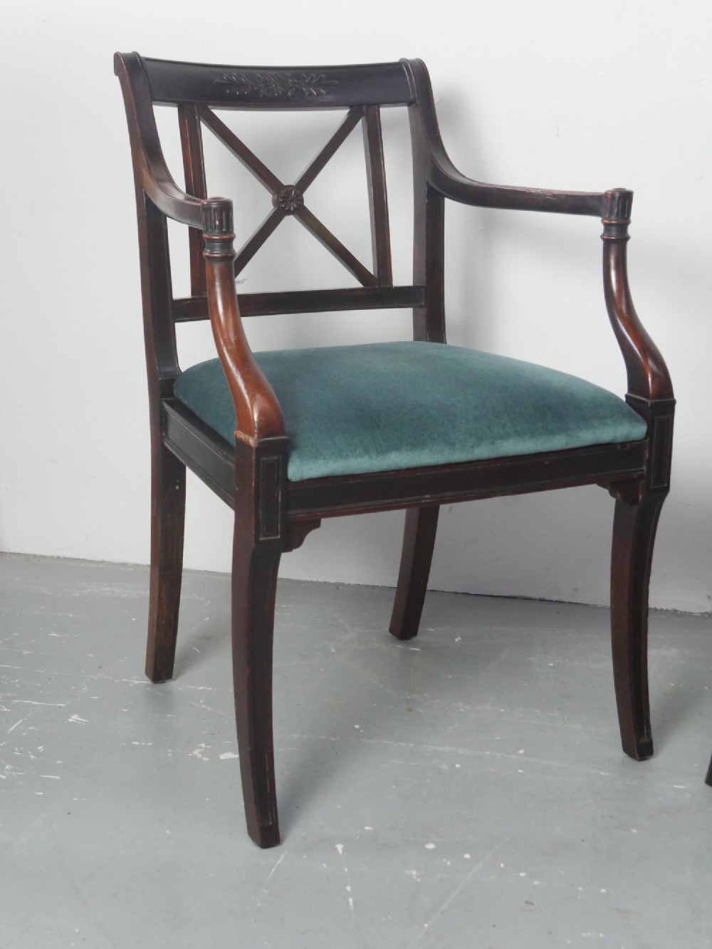 A pair of dark mahogany Regency Revival armchairs featuring cross-back splats, curved arms, and teal velvet upholstered seats. View III