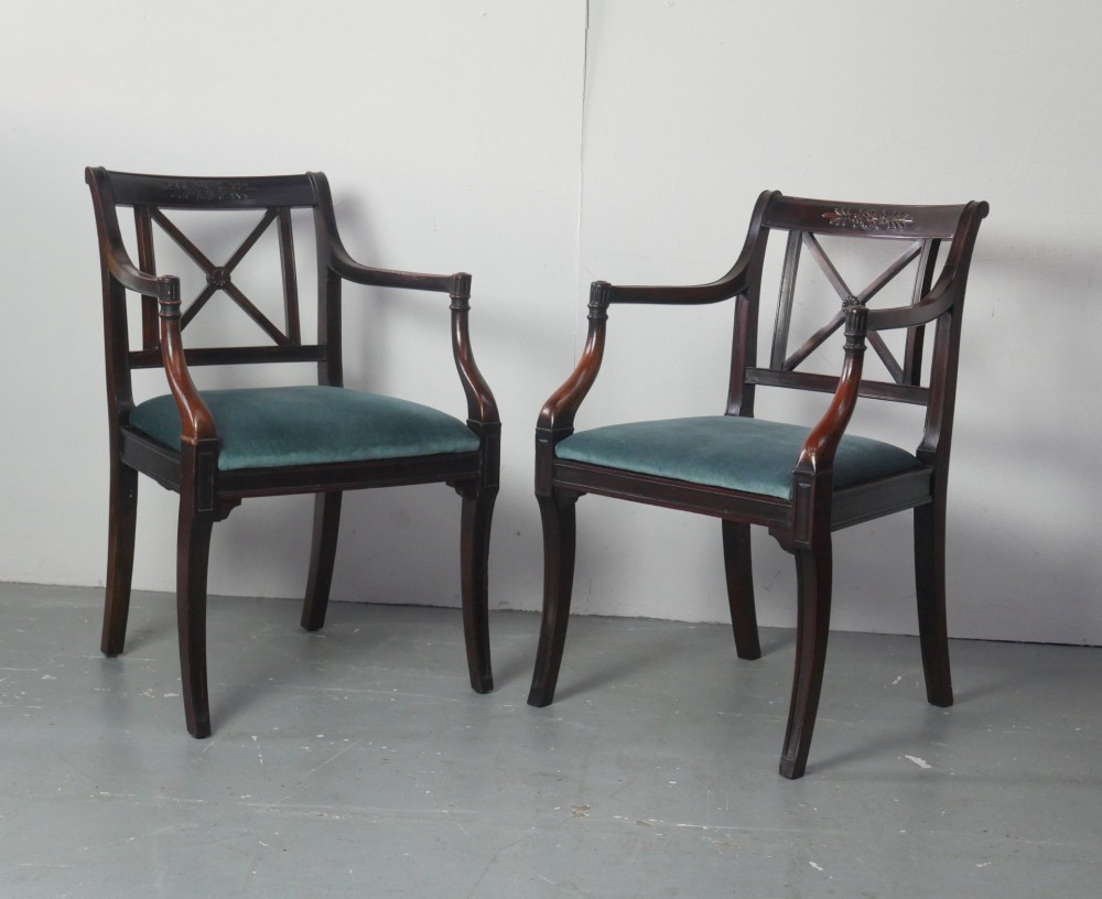 A pair of dark mahogany Regency Revival armchairs featuring cross-back splats, curved arms, and teal velvet upholstered seats. View XI