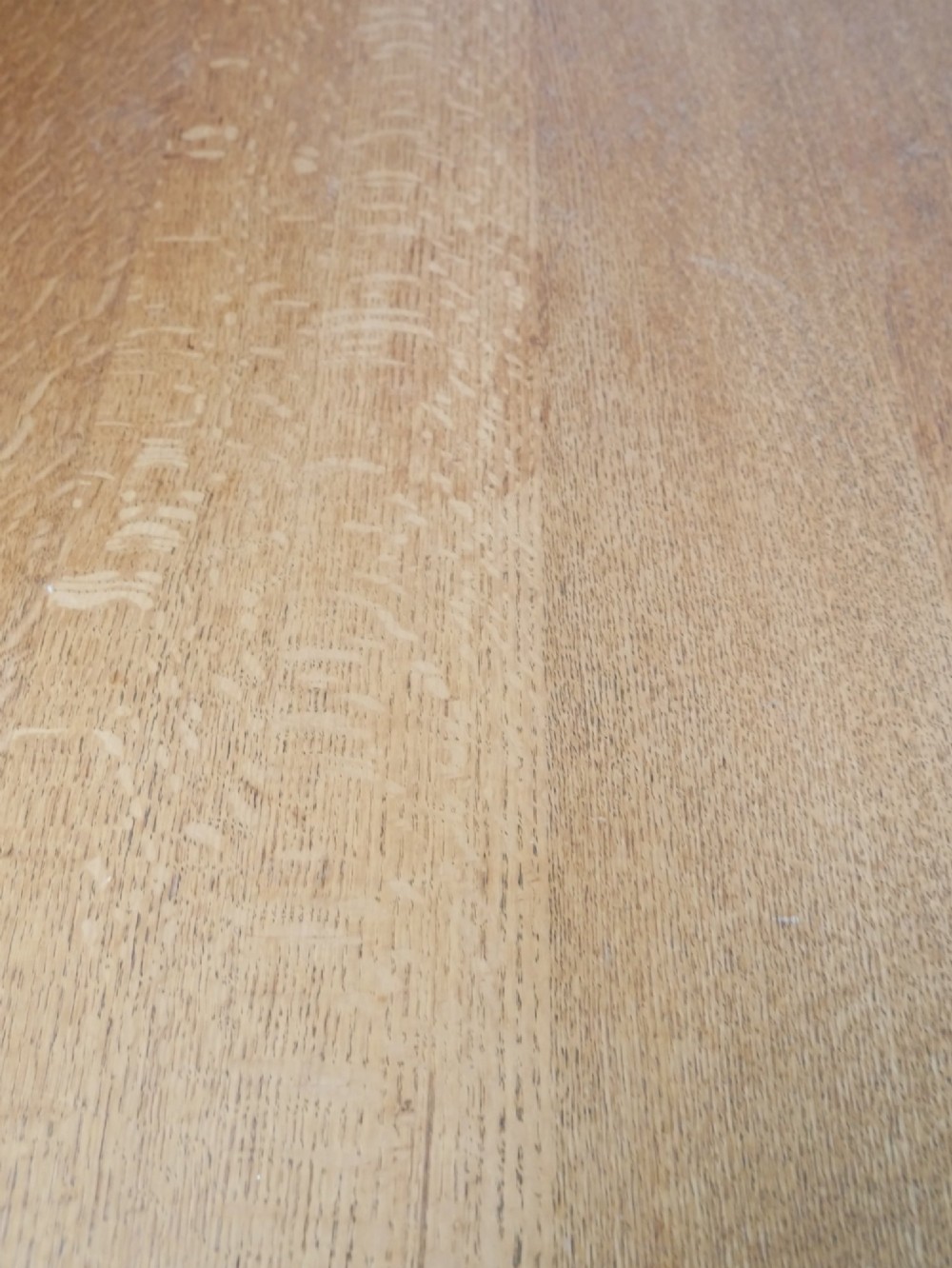 A rectangular solid oak kitchen dining table featuring shaped legs and a moulded edge top. View VI