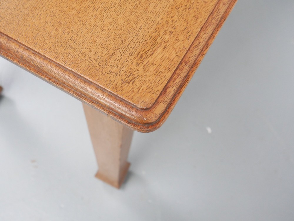 A rectangular solid oak kitchen dining table featuring shaped legs and a moulded edge top. View VIII