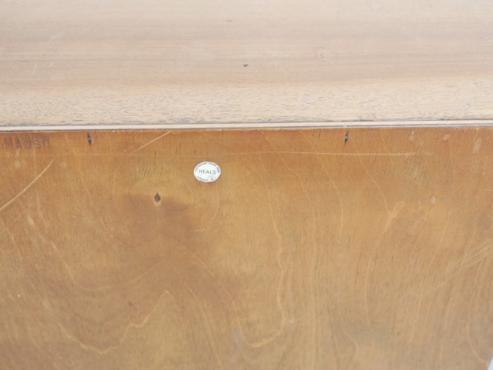 A mid-century open wooden side cabinet featuring asymmetrical shelving compartments and visible comb joints at the outer edges. View VII