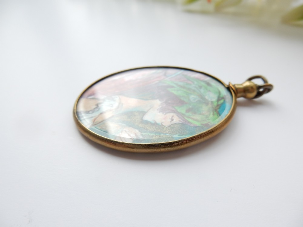 Antique Glass Locket depicting Painted Portrait of a Fairy View V