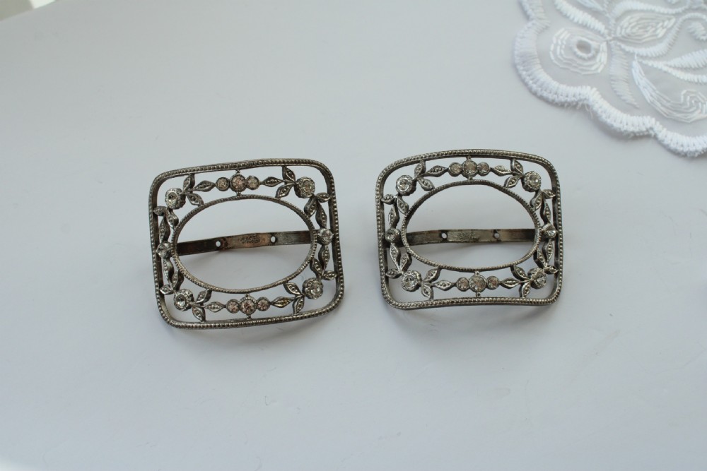 A pair of eighteenth-century Georgian paste glass and steel filigree shoe buckles in a fitted green velvet display box. View II