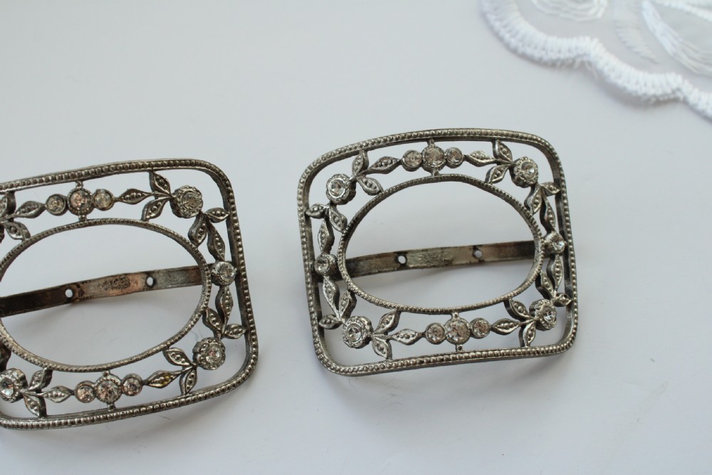 A pair of eighteenth-century Georgian paste glass and steel filigree shoe buckles in a fitted green velvet display box. View IV
