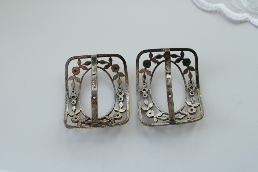 A pair of eighteenth-century Georgian paste glass and steel filigree shoe buckles in a fitted green velvet display box. View VI