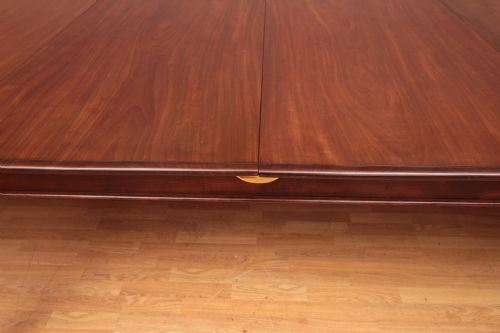 A CUBAN MAHOGANY EXTENDING DINING TABLE - ADDITIONAL PHOTO 2