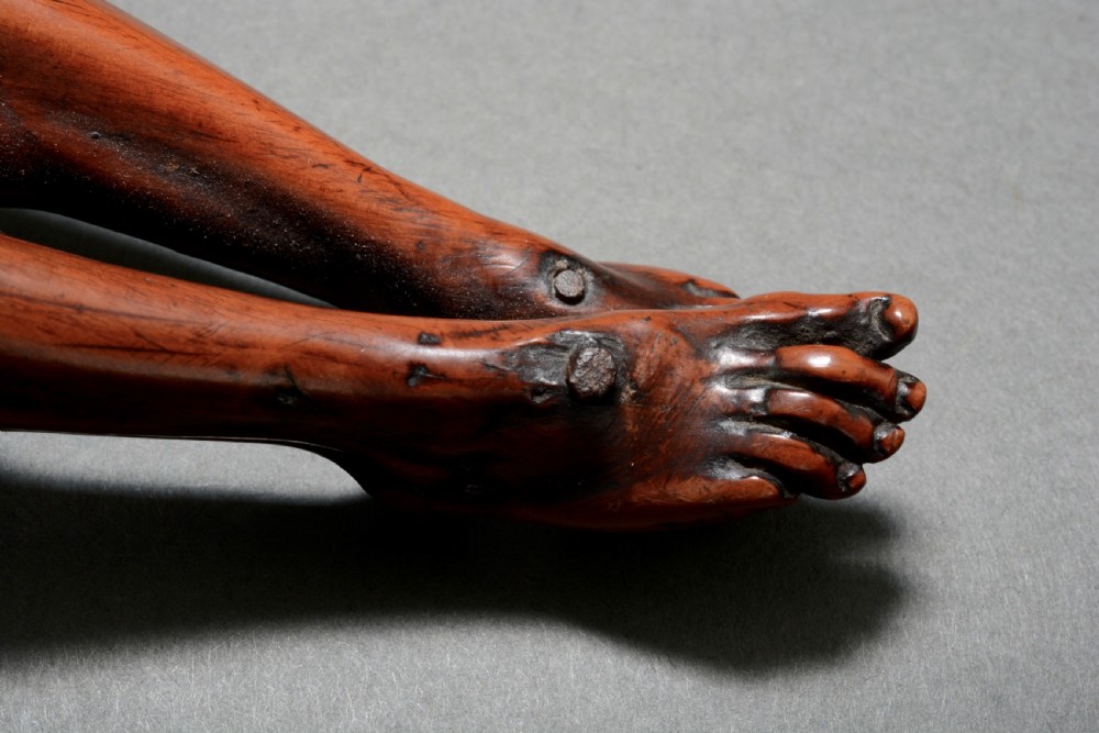 A hand carved fruitwood corpus figure from the 18th century View X