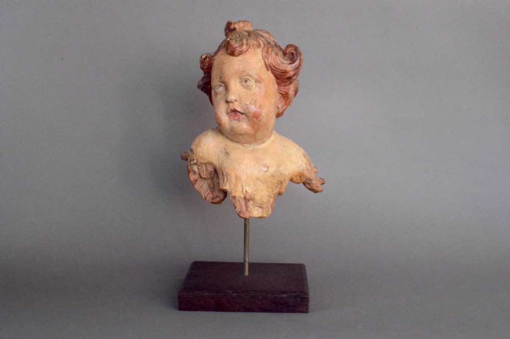 A beautiful antique carved wood Baroque Angel on stand