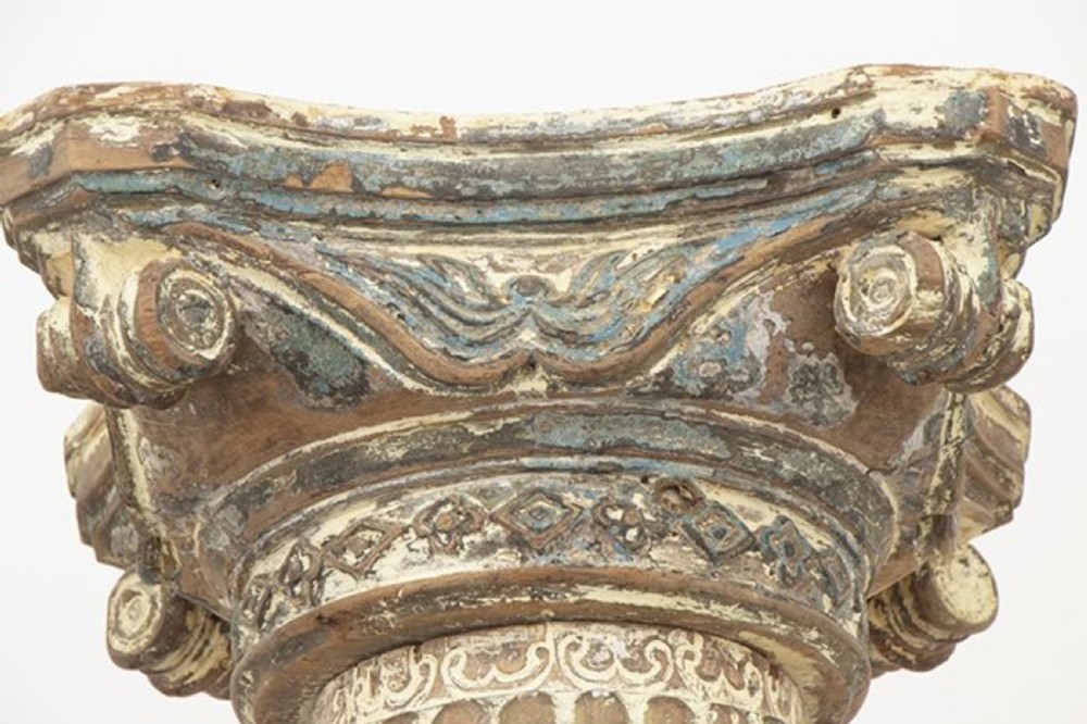 A tall 19th-century fluted architectural column with a carved capital and distressed off-white finish on a square base. View VII