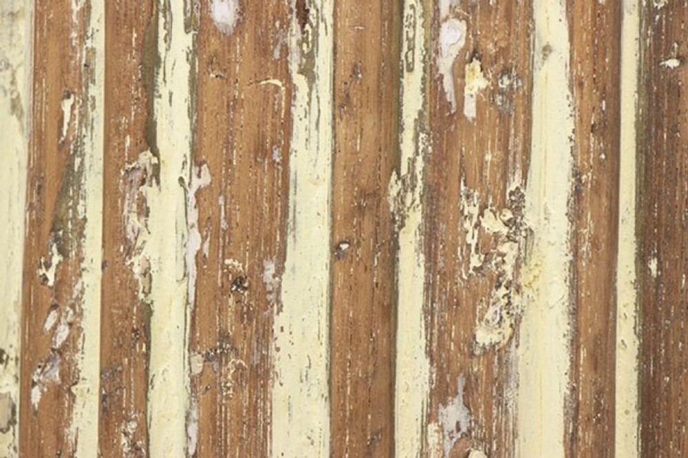 A tall 19th-century fluted architectural column with a carved capital and distressed off-white finish on a square base. View VIII