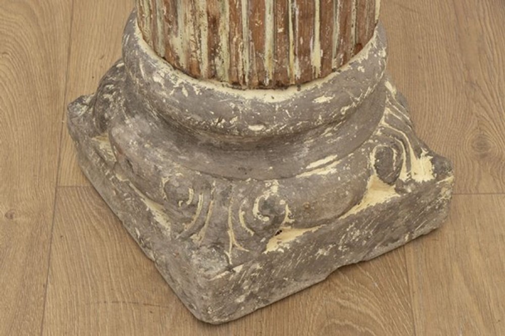 A tall 19th-century fluted architectural column with a carved capital and distressed off-white finish on a square base. View IX