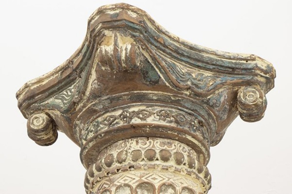 A tall 19th-century fluted architectural column with a carved capital and distressed off-white finish on a square base. View X