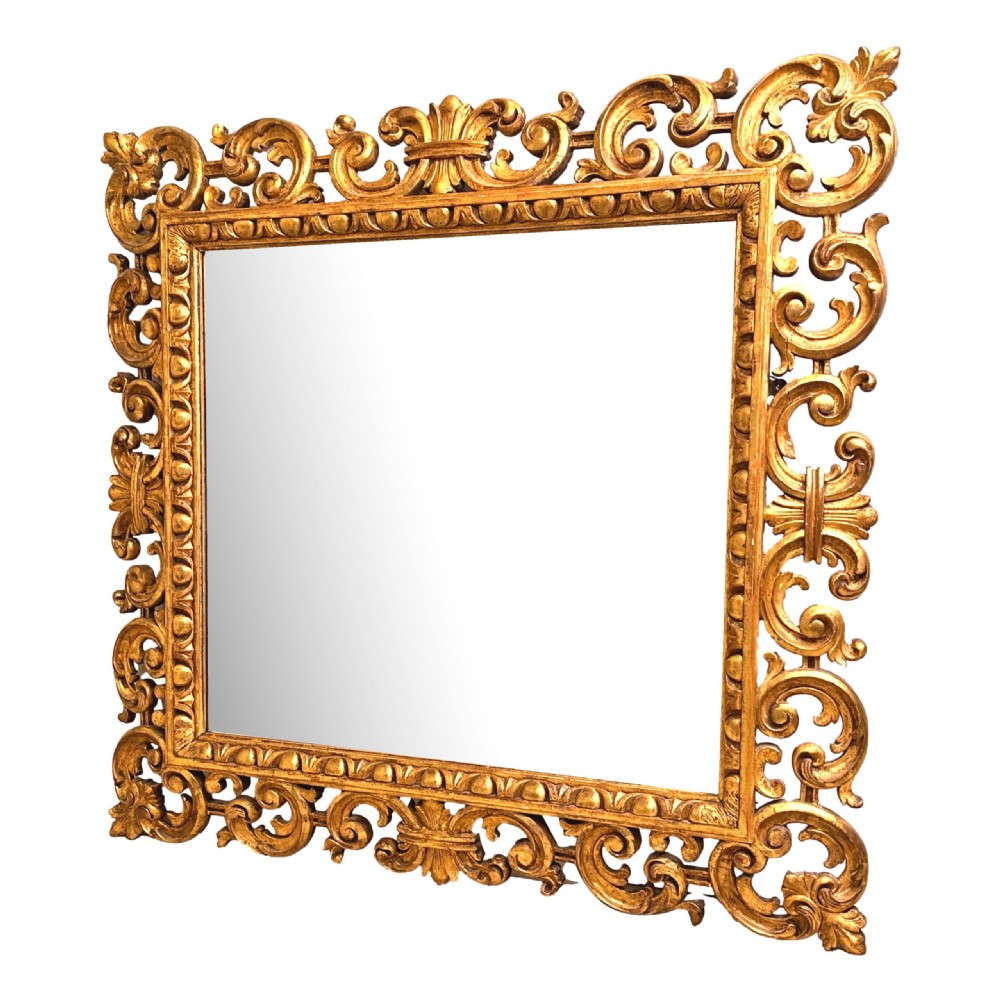 A late 18th-century Italian rectangular wall mirror featuring an intricate carved openwork giltwood frame with scroll motifs and acanthus leaf details. View XIII
